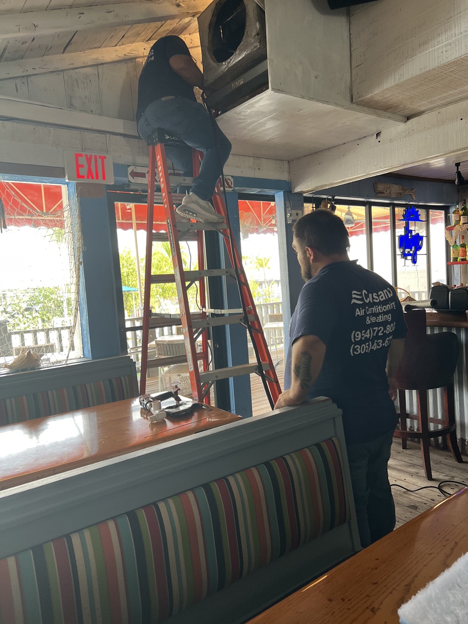Pull and clean of an evaporator up in attic of Key Largo Restaurant